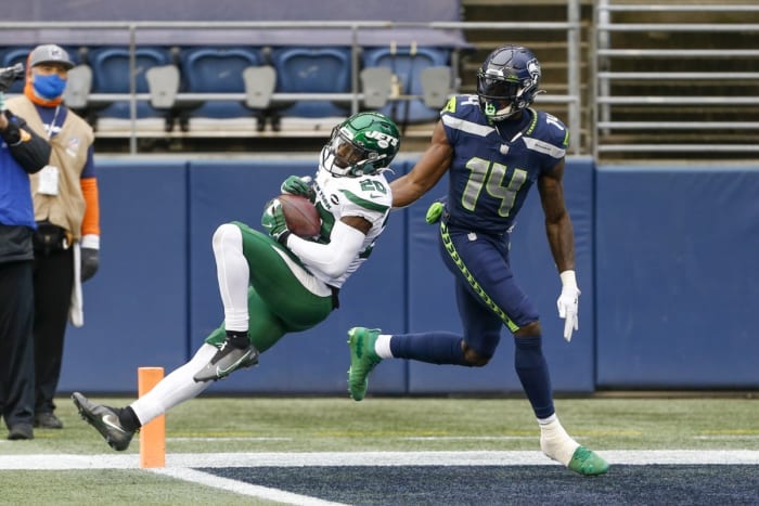 Former New York Jets safety Marcus Maye (20) intercepts a pass intended for Seattle Seahawks wide receiver DK Metcalf (14). Mandatory Credit: Joe Nicholson-USA TODAY Sports